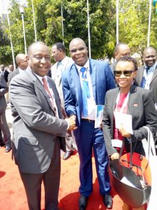 Jared Oundo with the minister of Treasury CS Henry Rotich
