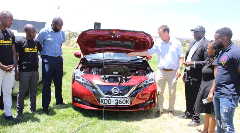 Tom Morton (centre) an electric car owner shows the Nissan leaf EV to attendants during the Electric Vehicle Expo in Buffalo Mall, Naivasha on 14/4/22. From Right: Iyadi O Iyadi Director EVCHAJA, Bertha Mvati Managing Director of VAELL Leasing, Jared Oundo the Executive Director Jubilant Stewards of Africa. From far left: Bramwel Randiga and Dennis Owuoche of VAELL Leasing and John Roman of African EV.
Image: Jared Rasugu